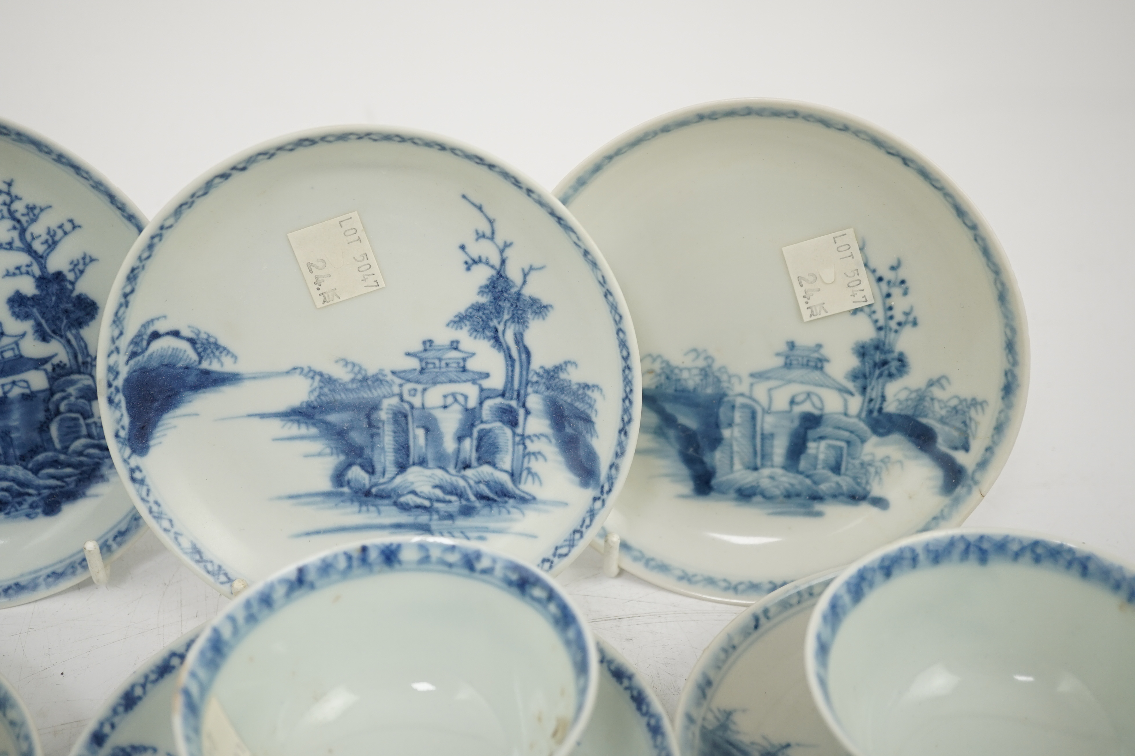A set of twenty four Chinese Nanking Cargo blue and white ‘large pagoda’ tea bowls and saucers, Qianlong period